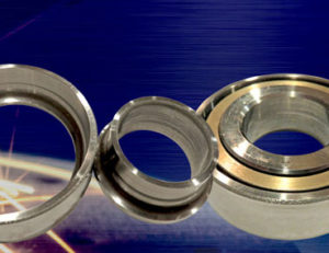 Additive Manufacturing Bearings - ball bearings against a dark blue background