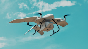 Delivery drone with a package in flight. EVTOL vehicles require quality bearings for long life and reliable flight.
